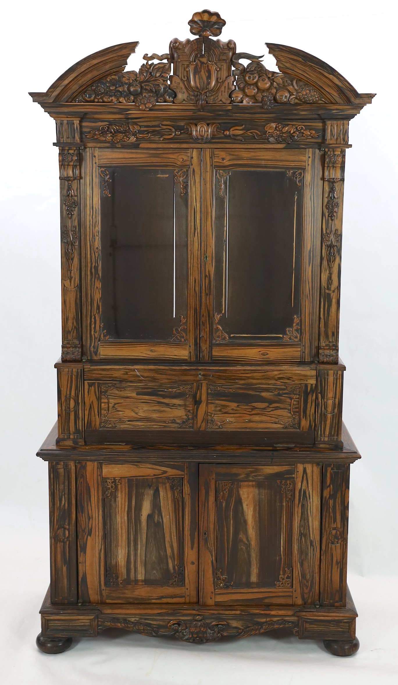 A 19th century Dutch colonial, possibly Ceylon ebony almirah, width 120cm, depth 50cm, height 235cm